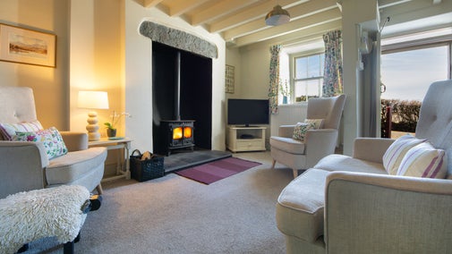 The sitting area in the open-plan room at 3 Siloam Cottage, Conwy
